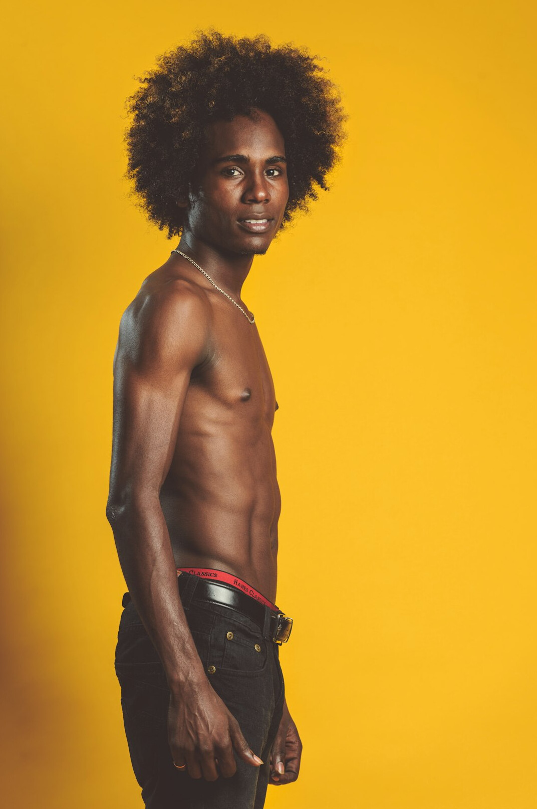 Studio portrait of an Afro-Brazilian man smiling