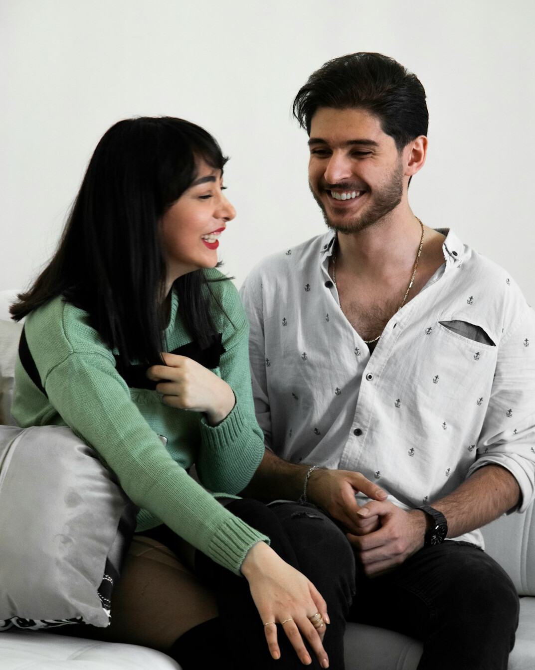 couple talking on couch